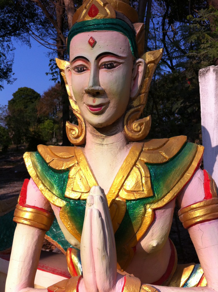 Wooden statue in the main village of Ko Samet, Thailand Wooden statue in the main village of Ko Samet, Thailand