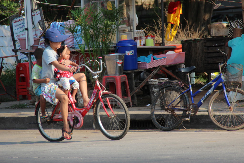 Bike riding in a Thai village