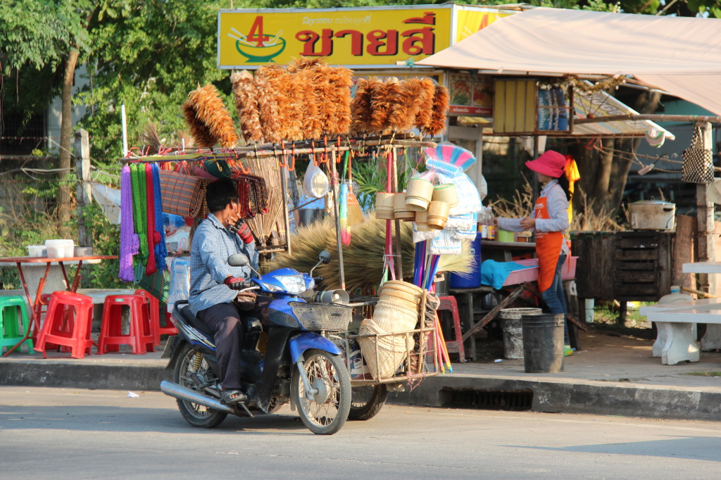 Thai village life, a Ban Phe brush seller