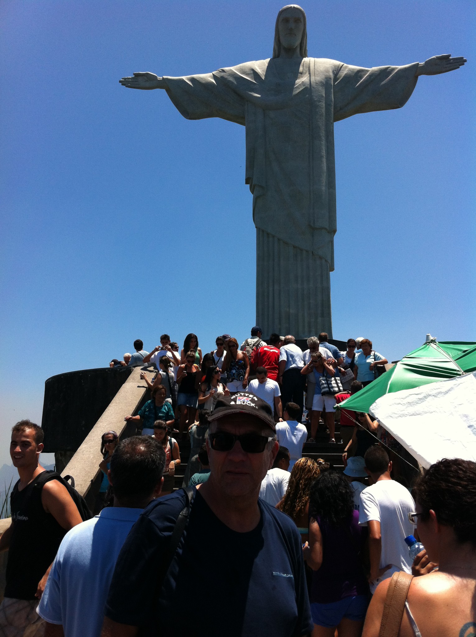 Christ the Redeemer and tourists visiting Christ the Redeemer and tourists