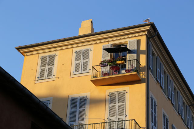 A sunny apartment balcony in the Old Town of Nice A sunny apartment balcony in the Old Town of Nice