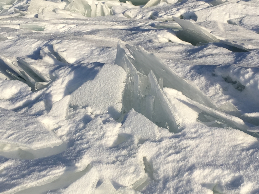 Packed ice on the frozen lake Packed ice on the frozen lake