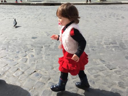 Little girl running on Piazza Navona, Rome Little girl running on Piazza Navona, Rome