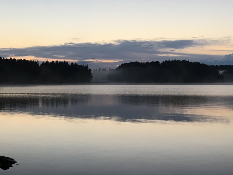 Lake Näsijärvi reflections after sunset Lake and mist after sunset, Finland