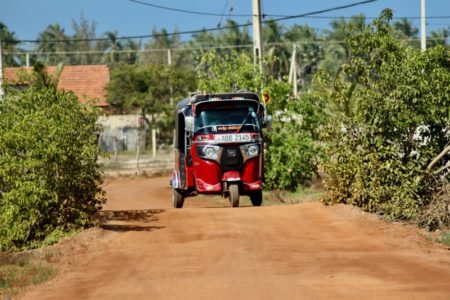 Tuk tuk on village road