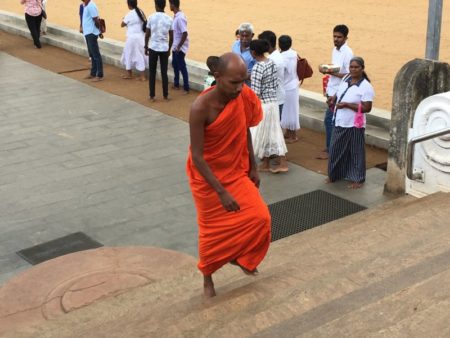 Buddhist monk entering Ruwanwelisiya Dagoba