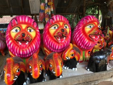 Lions and elephants sold in a stall