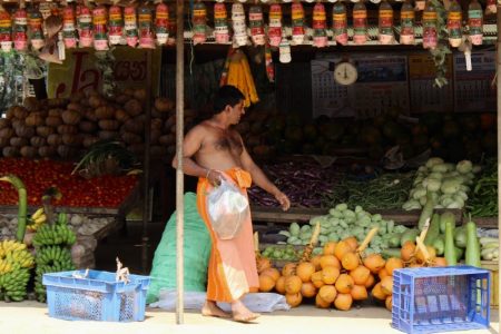 Man and fruit stall, Sri Lanka's South Coast