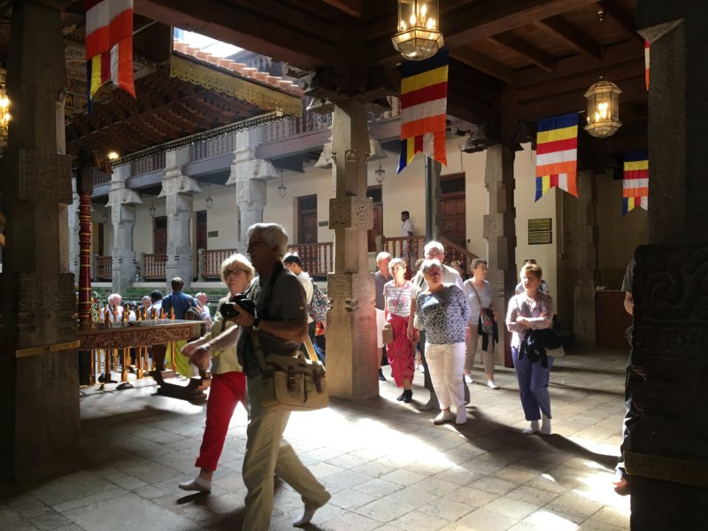 Tourists visiting the Temple of the Tooth Tourists visiting the Temple of the Tooth