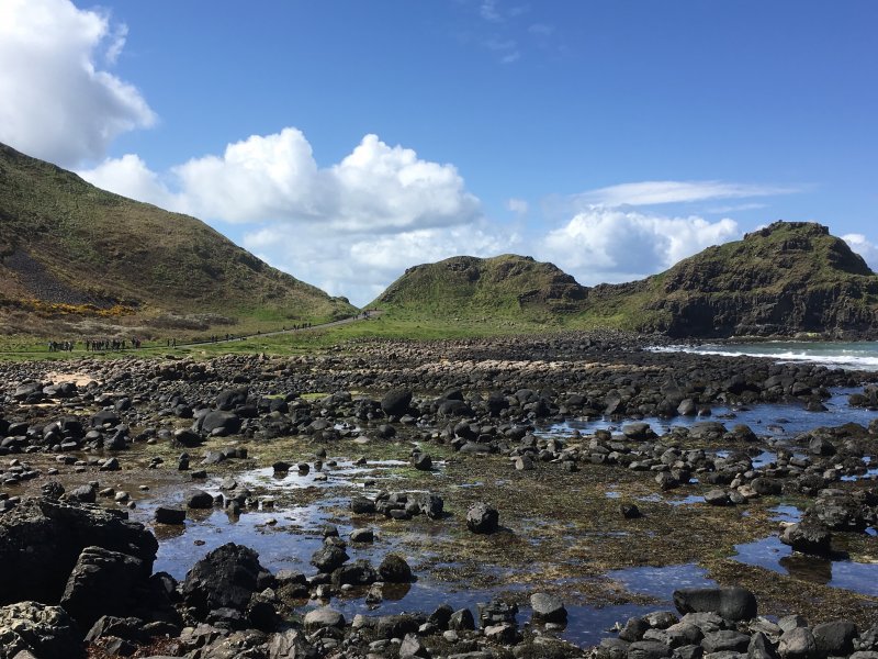 Giants Causeway stones and people walking