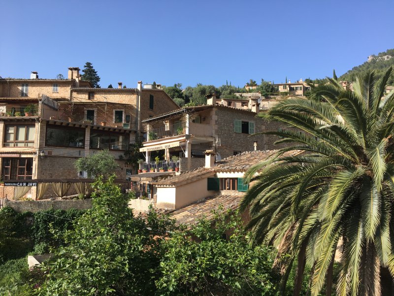 Houses behind the river Houses of Deia, Serra de Tramuntana