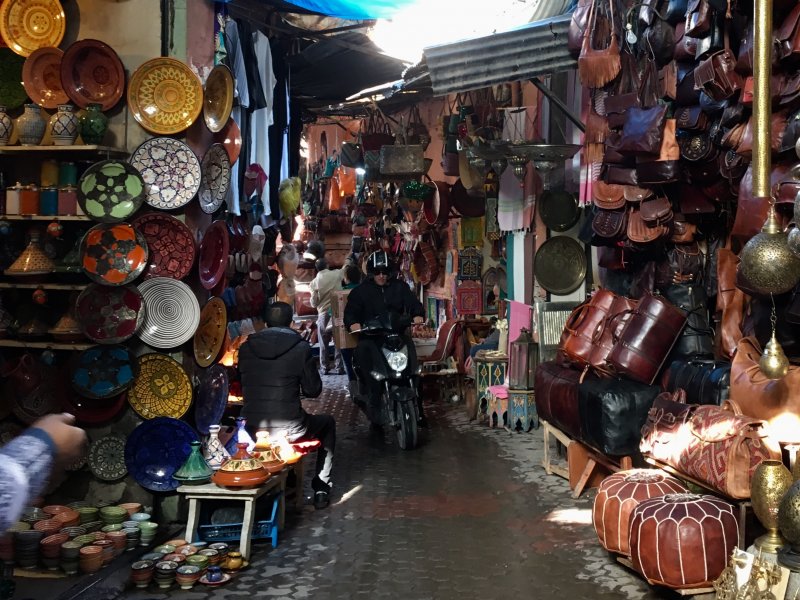 Bike coming from behind the corner, Marrakech