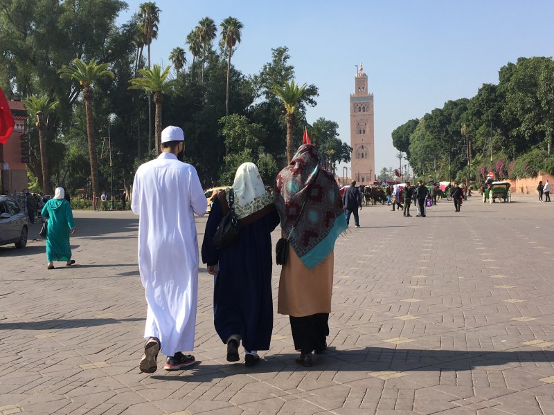 Locals walking on Jemaa el-Fna, Marrakech Locals walking on Jemaa el-Fna, Marrakech