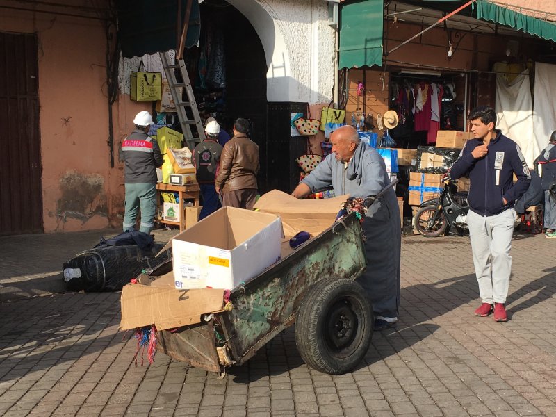 Man with his load in the souks of Marrakech