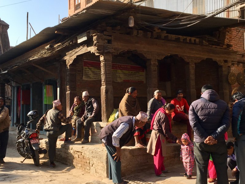 Nepal people: a family gathering on the square Nepal people: a family gathering on the square