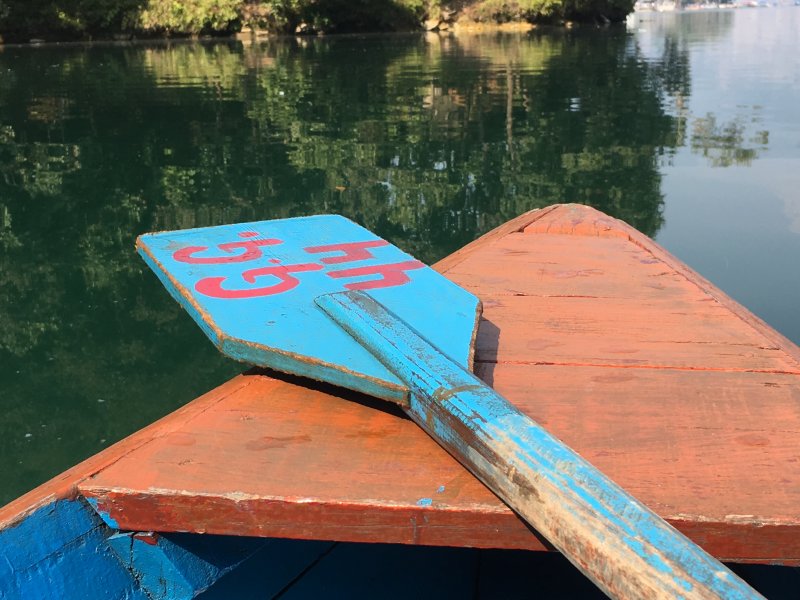 The ores and boats had different numbers Boating on Lake Phewa, Pokhara