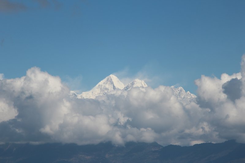 Mountains behind the clouds The Himalayas from Prakriti Resort