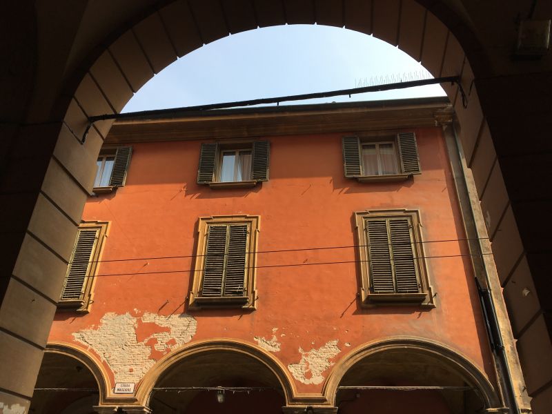 Bologna Strada Maggiore windows and arches Bologna windows and arcade
