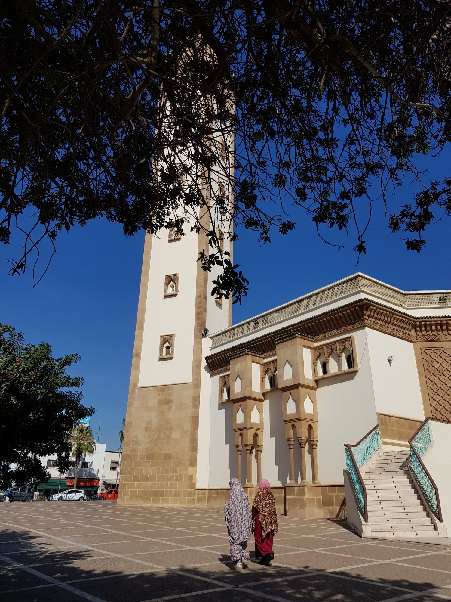 A Talborjt mosque and Moroccan women A Talborjt mosque and Moroccan women