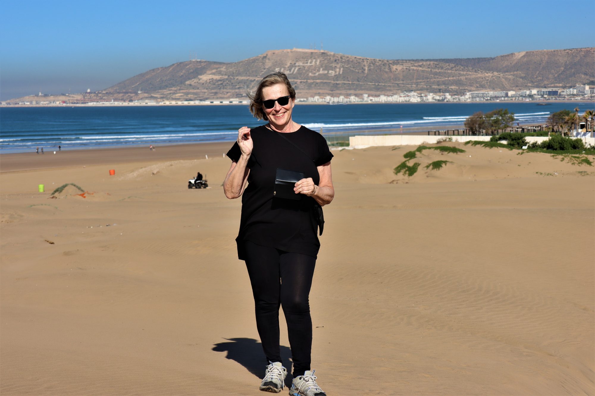 Walking on the beach sands Walking on the beach sands