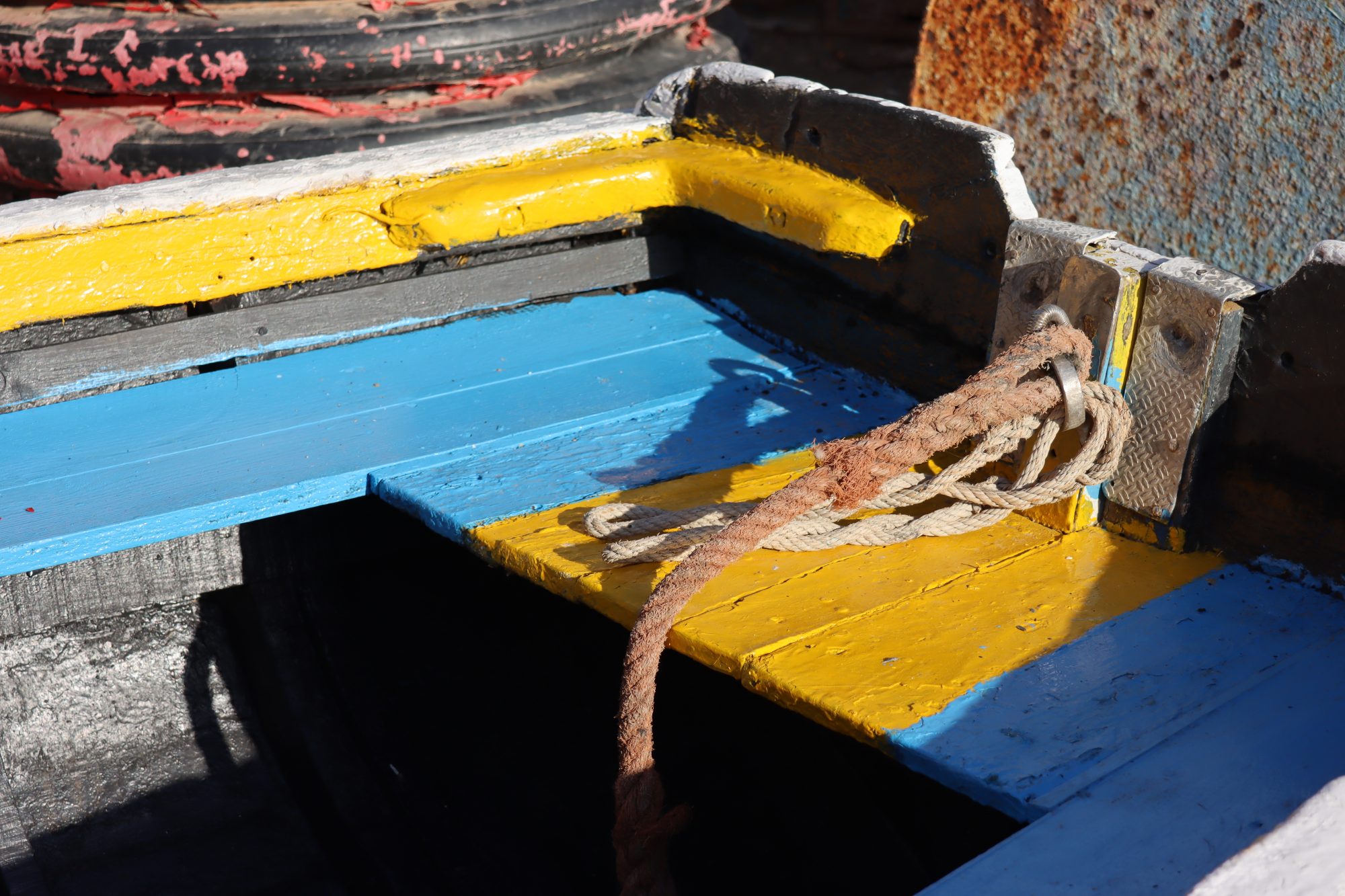 Moroccan fishing boat in blue and yellow Moroccan fishing boat in blue and yellow