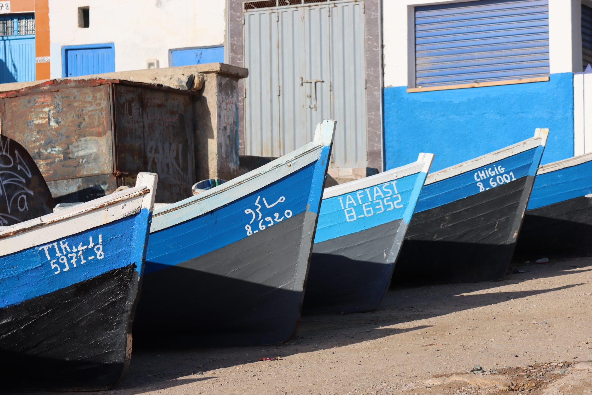Blue Moroccan fishing boats in a row Blue Moroccan fishing boats in a row