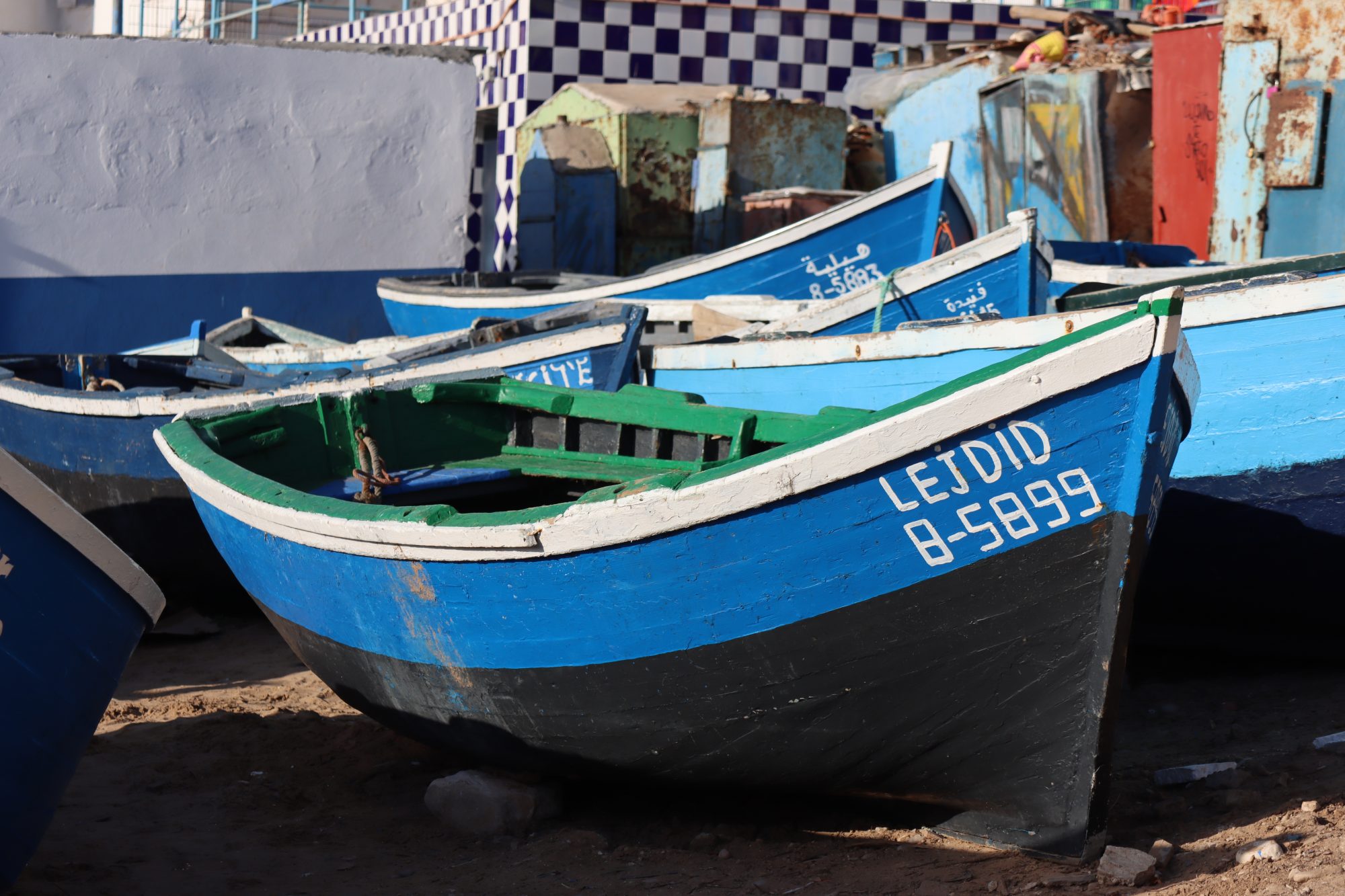 Blue Moroccan fishing boats in a row Blue Moroccan fishing boats in a row