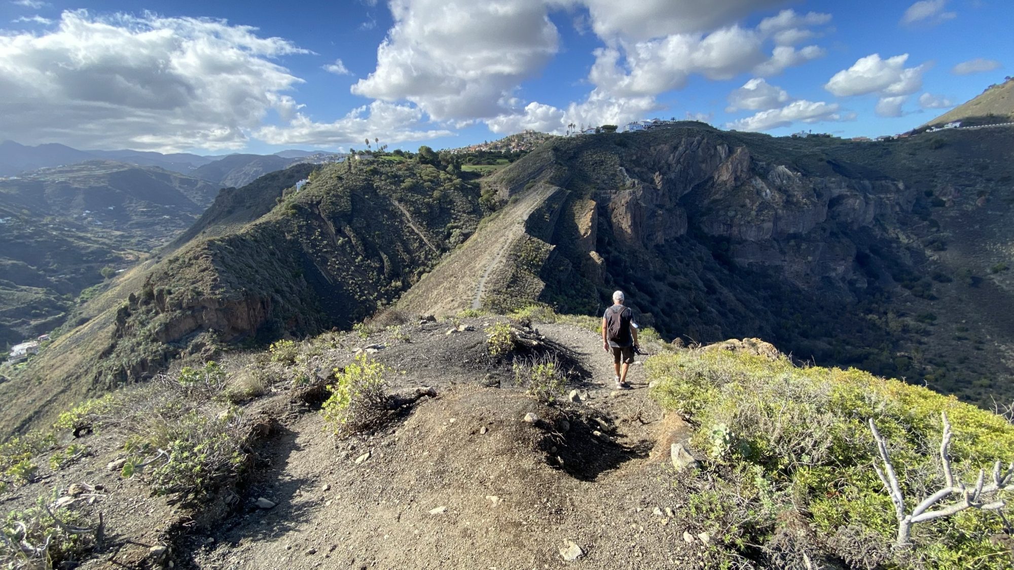 Hiking at the edge of Caldera de Bandama, Gran Canaria east coast drive Hiking at the edge of Caldera de Bandama, Gran Canaria east coast drive